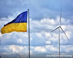 Ukraine flag in front of windmill