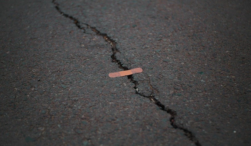 Band-aid on road crack
