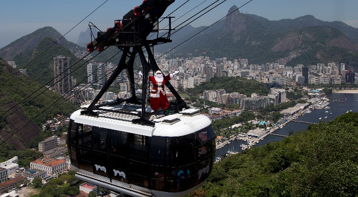 Santa Claus rides a cable car in Rio de Janeiro