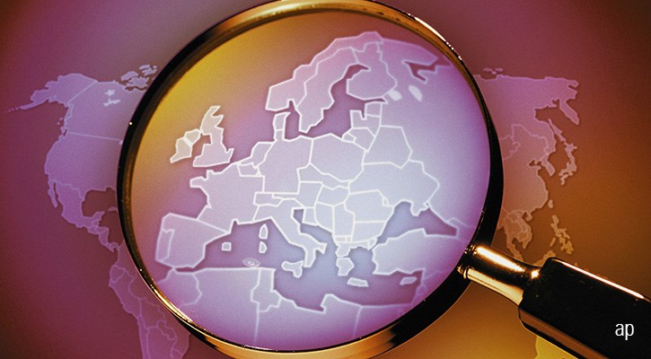 European map under magnifying glass