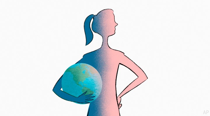 Woman holding the world