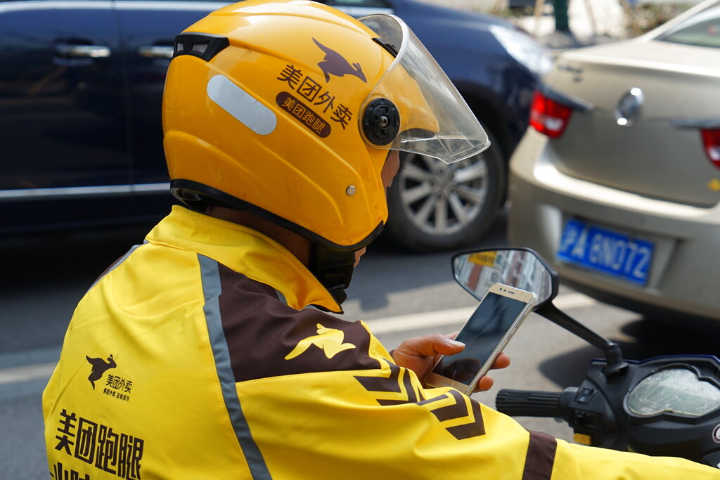 Meituan Cuts Fees, Faces Pressure from New Business
