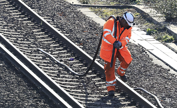 Network Rail worker on the train tracks