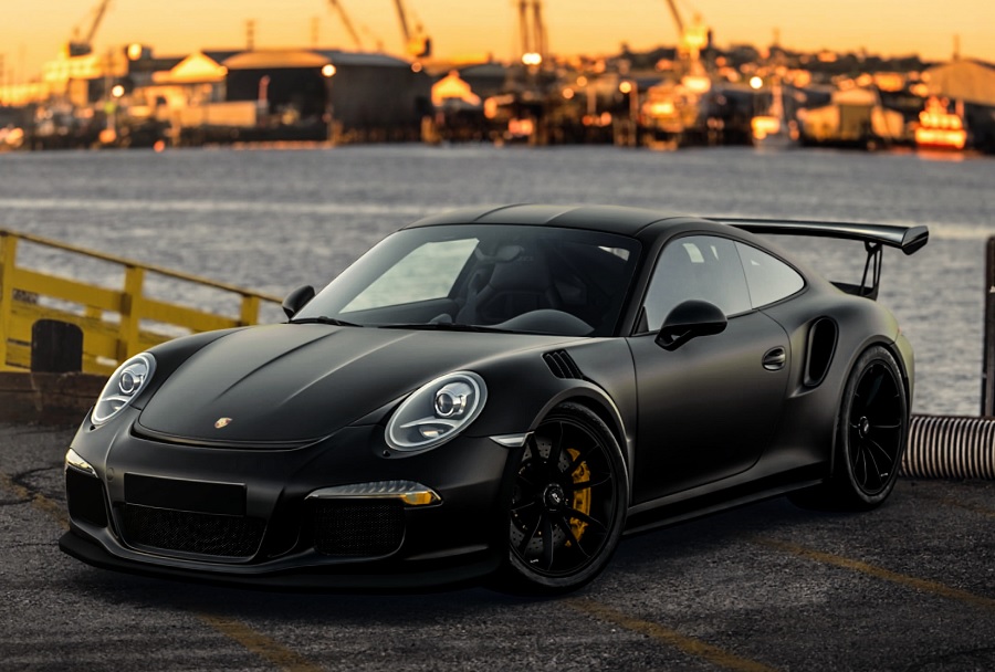 Black Porsche by the Sea