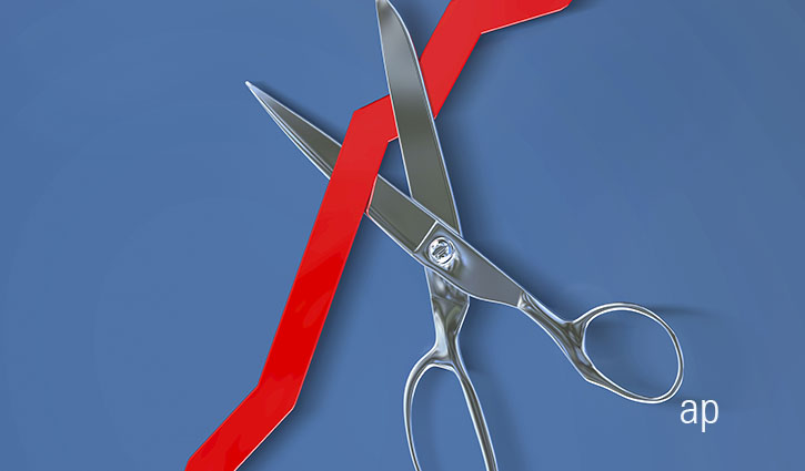 Scissors cutting ribbon