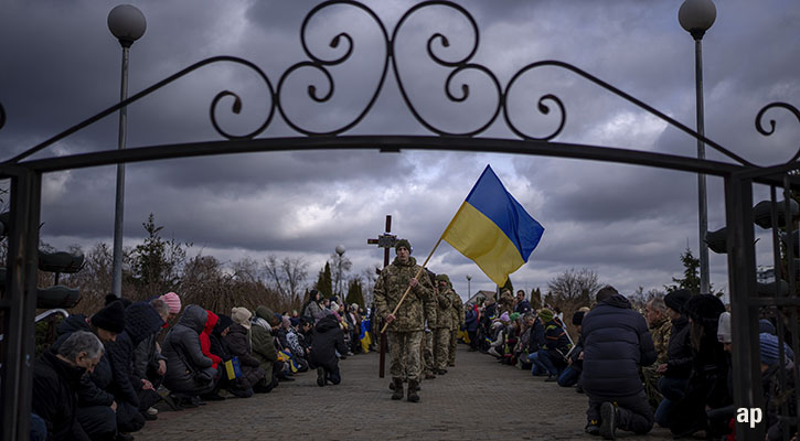 Soldier attends funeral Ukraine War