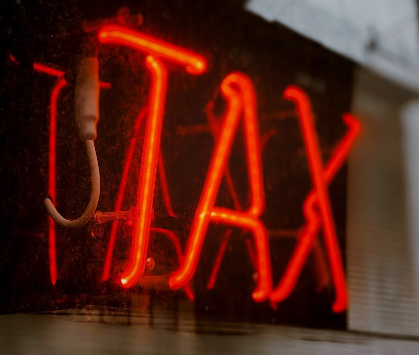 Neon tax sign