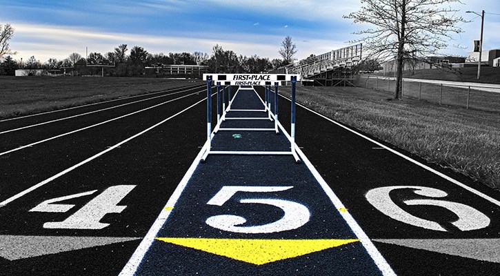 Running track with hurdles