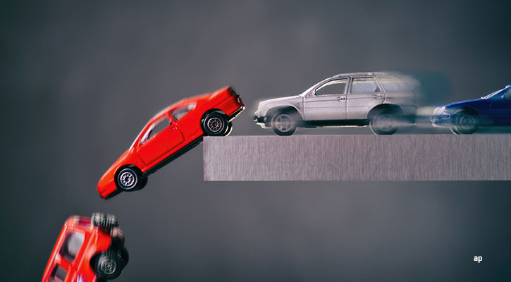 toy cars flying off a shelf